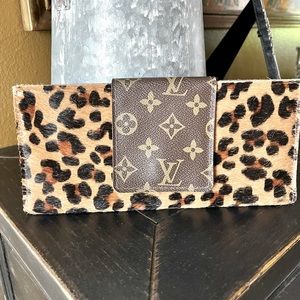 Leather calf hair wallet with LV accent